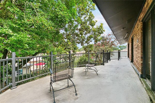 3213 Tolmas Dr, Metairie, LA 70002 - view of patio featuring a balcony