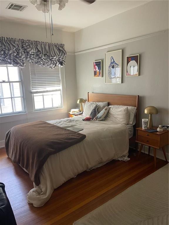 1222 Broadway St, New Orleans, LA 70118 - bedroom with wood finished floors and a ceiling fan