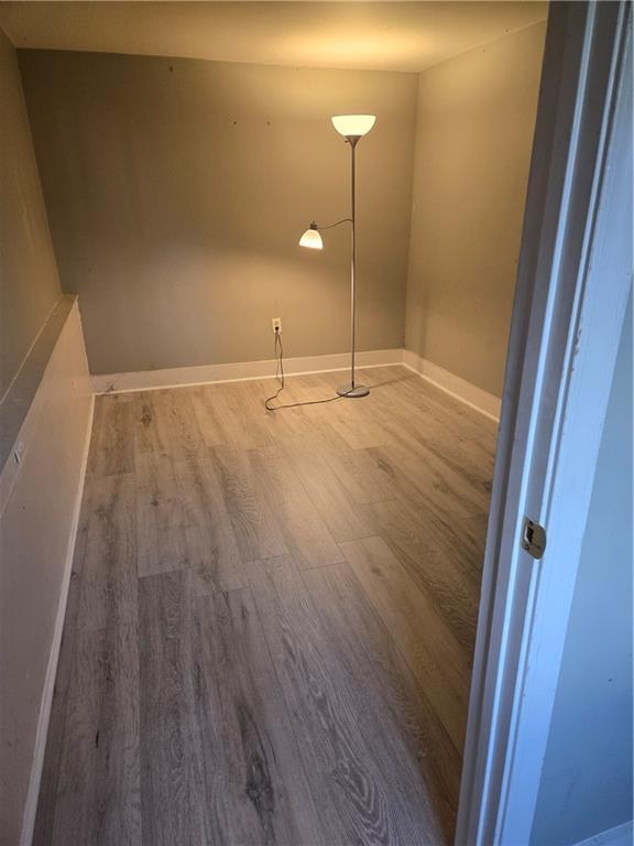 1222 Broadway St, New Orleans, LA 70118 - detailed view of wood finished floors and baseboards