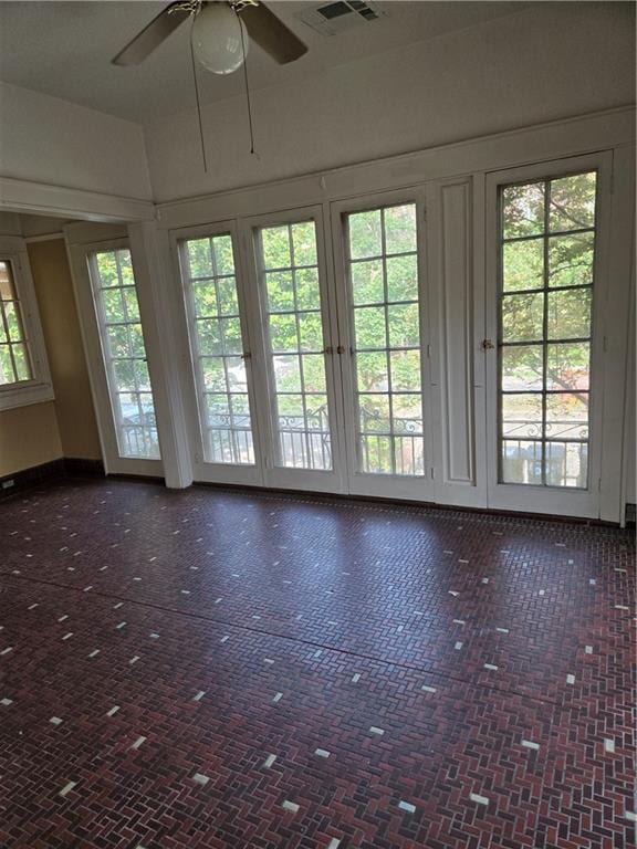 1222 Broadway St, New Orleans, LA 70118 - unfurnished room with brick patterned floors, ceiling fan, and baseboards