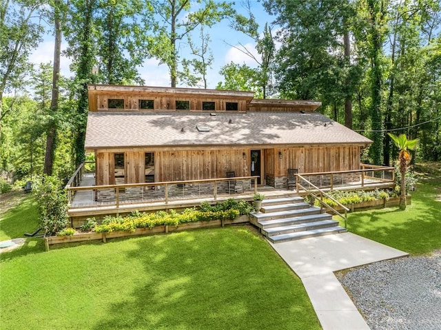 132 Pine Oak Dr, Covington, LA 70433 - view of front of home featuring a front yard, roof with shingles, and covered porch