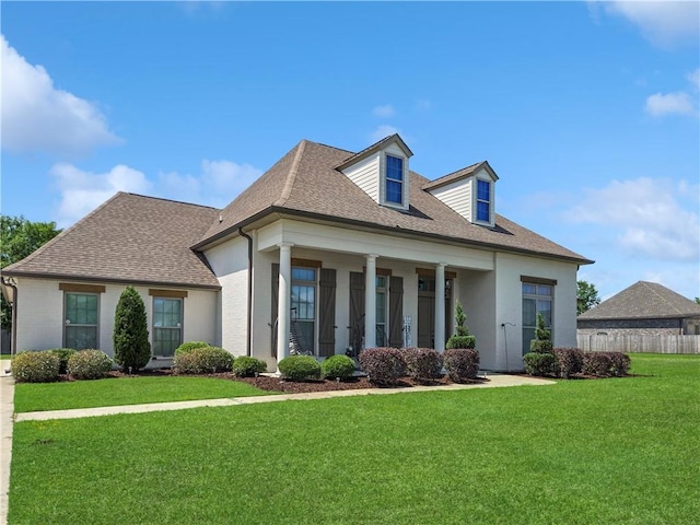 531 N Caleb Dr, Slidell, LA 70461 - view of front facade with roof with shingles, stucco siding, and a porch