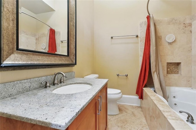 3400 Magazine St Unit 15, New Orleans, LA 70115 - full bath with a combined bath / shower with jetted tub, vanity, toilet, tile patterned flooring, and baseboards