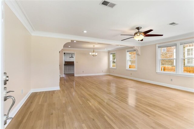 6141 Canal Blvd, New Orleans, LA 70124 - spare room featuring ornamental molding, a chandelier, light wood-type flooring, ceiling fan, and baseboards