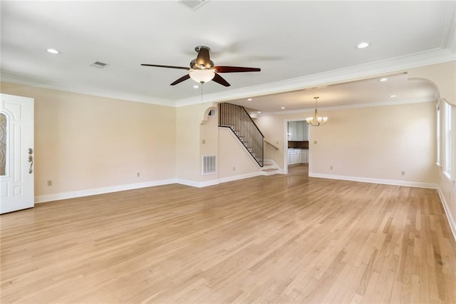 6141 Canal Blvd, New Orleans, LA 70124 - unfurnished living room with stairs, light wood finished floors, a ceiling fan, arched walkways, and recessed lighting