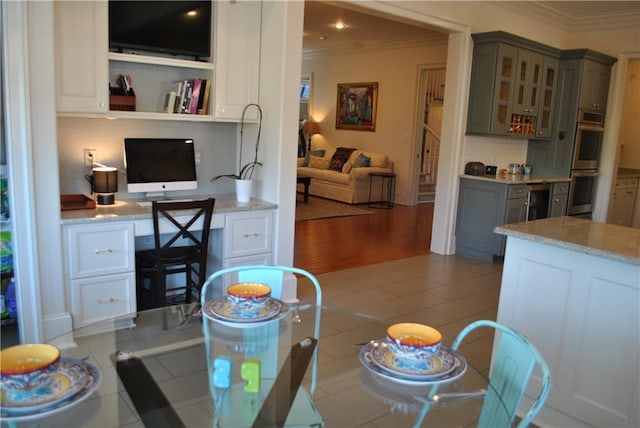 6925 Canal Blvd, New Orleans, LA 70124 - tiled dining area featuring plenty of natural light and a chandelier