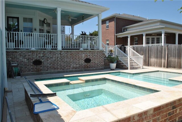 6925 Canal Blvd, New Orleans, LA 70124 - view of pool with a patio, stairway, and a pool with connected hot tub