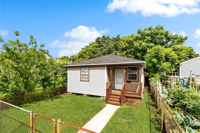 811 Tricou St, New Orleans, LA 70117 - bungalow-style home featuring roof with shingles