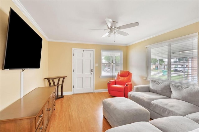 1517 Frankel Ave, Metairie, LA 70003 - living area featuring crown molding, light wood finished floors, ceiling fan, and baseboards