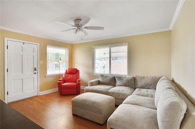 1517 Frankel Ave, Metairie, LA 70003 - living area featuring wood finished floors, ceiling fan, crown molding, and baseboards
