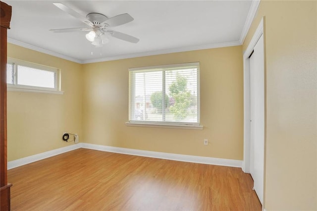 1517 Frankel Ave, Metairie, LA 70003 - unfurnished bedroom featuring light wood finished floors, a closet, baseboards, and ornamental molding