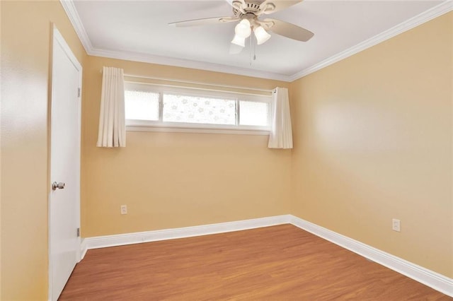 1517 Frankel Ave, Metairie, LA 70003 - empty room with wood finished floors, ceiling fan, baseboards, and ornamental molding