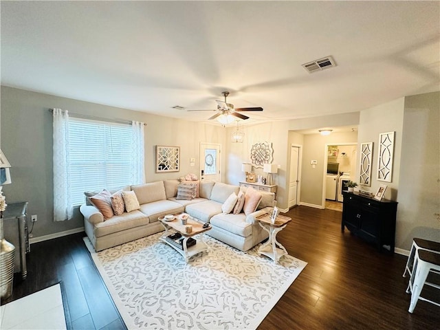 306 Allie Ln, Luling, LA 70070 - living room with dark wood finished floors, ceiling fan, and baseboards