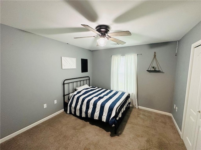 306 Allie Ln, Luling, LA 70070 - carpeted bedroom with baseboards and a ceiling fan