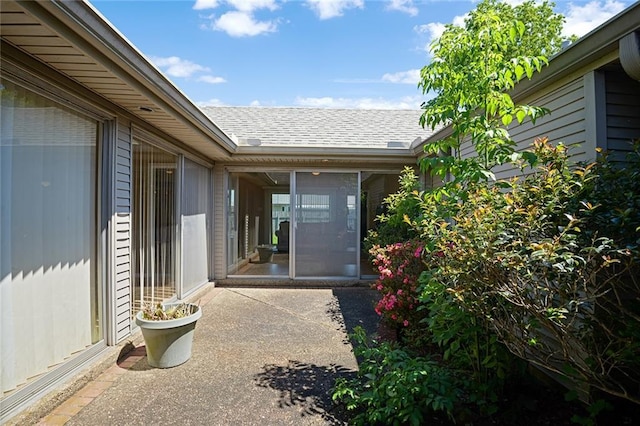 5705 Lafreniere St, Metairie, LA 70003 - entrance to property featuring roof with shingles and a patio