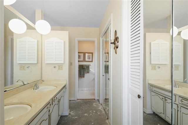 5705 Lafreniere St, Metairie, LA 70003 - full bathroom featuring baseboards, double vanity, and a closet
