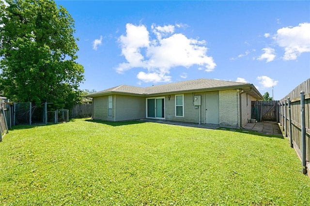 5705 Lafreniere St, Metairie, LA 70003 - rear view of house with a gate