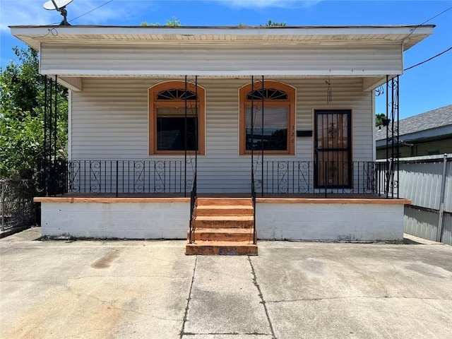 320 De Armas St, New Orleans, LA 70114 - property entrance featuring a porch