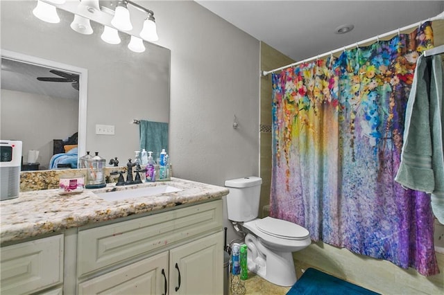 11276 Fernley Dr, New Orleans, LA 70128 - bathroom with vanity, toilet, curtained shower, ensuite bathroom, and tile patterned flooring