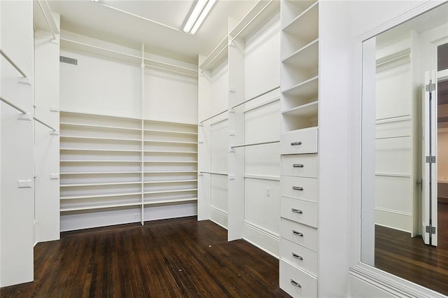 1633 Dufossat St, New Orleans, LA 70115 - walk in closet with dark wood-style floors