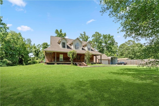 25766 La Highway 1032, Denham Springs, LA 70726 - view of front of house with a porch, a front lawn, and a garage