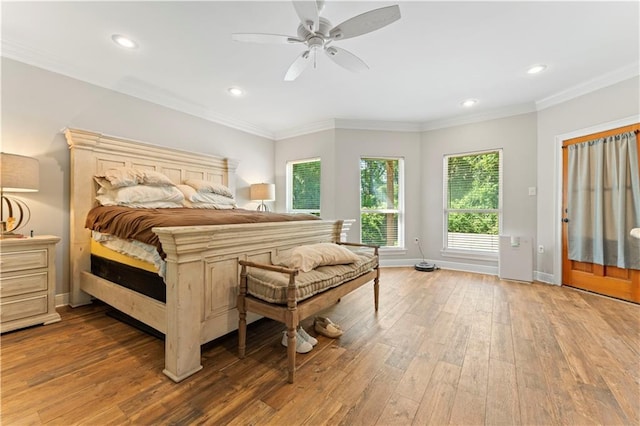 25766 La Highway 1032, Denham Springs, LA 70726 - bedroom featuring hardwood / wood-style floors, baseboards, recessed lighting, ornamental molding, and a ceiling fan