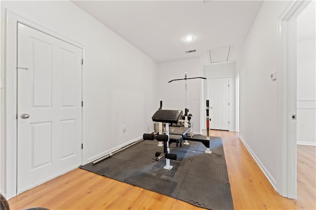 25766 La Highway 1032, Denham Springs, LA 70726 - exercise room with light wood-style flooring, attic access, baseboards, and recessed lighting