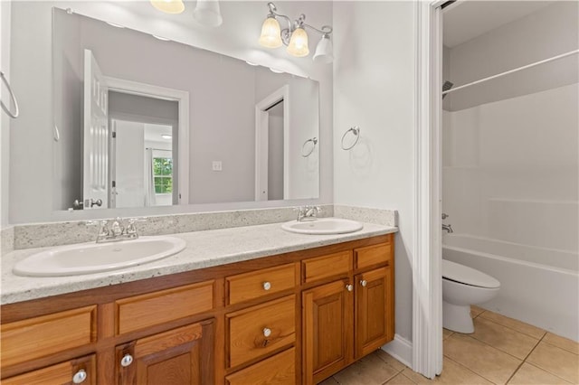 25766 La Highway 1032, Denham Springs, LA 70726 - bathroom featuring double vanity, toilet, tile patterned flooring, and shower / washtub combination