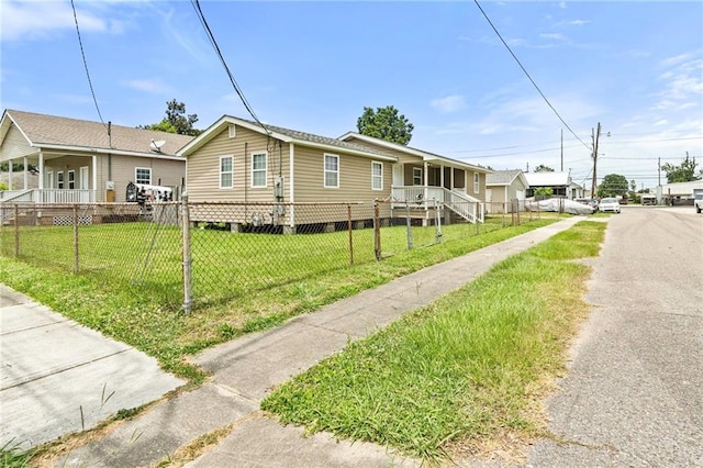 401 Oak Ave, Harahan, LA 70123 - view of side of home with a porch