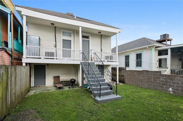2305 Soniat St, New Orleans, LA 70115 - rear view of property featuring stairway