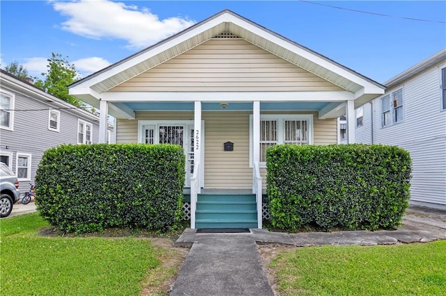 2622 Wisteria St, New Orleans, LA 70122 - shotgun-style home with a porch