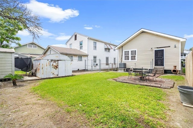 2622 Wisteria St, New Orleans, LA 70122 - rear view of property with a patio area, entry steps, and central AC unit