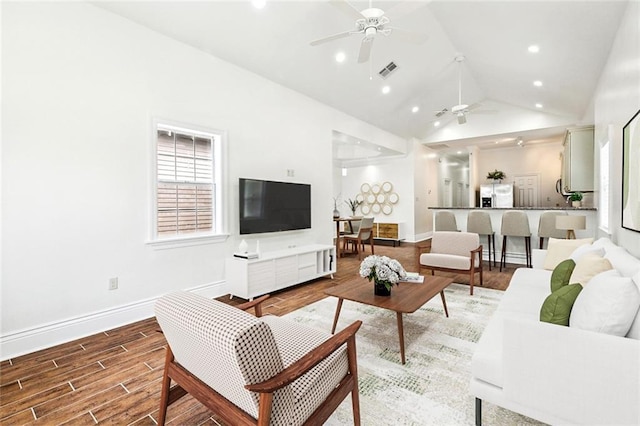 3316 Calhoun St, New Orleans, LA 70125 - living area featuring a ceiling fan, vaulted ceiling, wood finished floors, baseboards, and recessed lighting