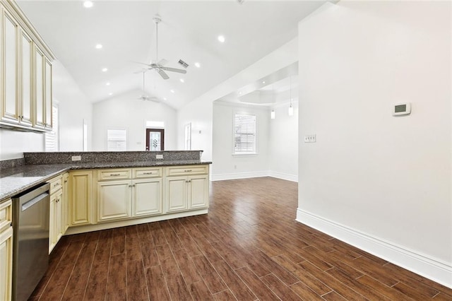 3316 Calhoun St, New Orleans, LA 70125 - kitchen with cream cabinets, dishwasher, ceiling fan, dark wood-style floors, and vaulted ceiling