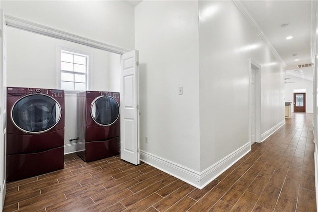 3316 Calhoun St, New Orleans, LA 70125 - washroom with independent washer and dryer, dark wood-style floors, baseboards, and ornamental molding