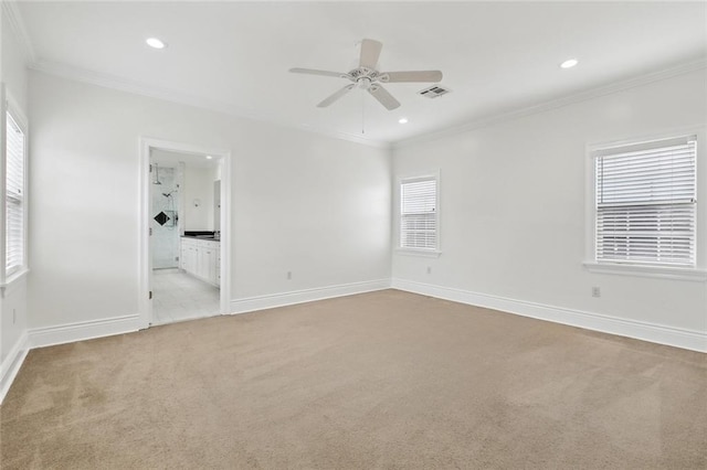 3316 Calhoun St, New Orleans, LA 70125 - unfurnished room featuring light carpet, healthy amount of natural light, ornamental molding, ceiling fan, and baseboards