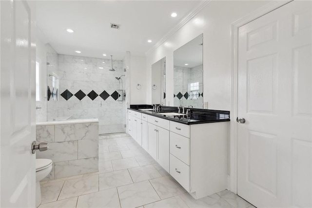 3316 Calhoun St, New Orleans, LA 70125 - full bath featuring marble look tile flooring, vanity, ornamental molding, tiled shower, and toilet