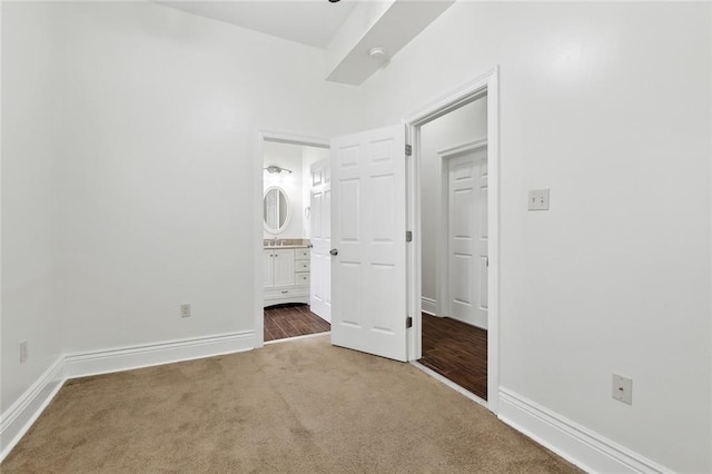 3316 Calhoun St, New Orleans, LA 70125 - unfurnished bedroom with carpet, baseboards, and ensuite bathroom