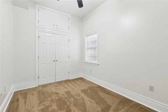 3316 Calhoun St, New Orleans, LA 70125 - unfurnished bedroom featuring carpet floors, baseboards, a closet, and ceiling fan