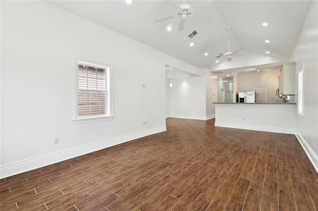 3316 Calhoun St, New Orleans, LA 70125 - unfurnished living room featuring a ceiling fan, dark wood-style floors, baseboards, recessed lighting, and high vaulted ceiling
