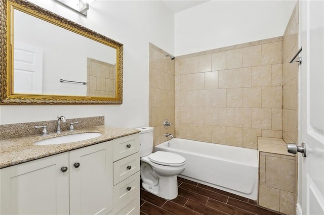3316 Calhoun St, New Orleans, LA 70125 - bathroom with toilet, vanity, wood tiled floors, and washtub / shower combination