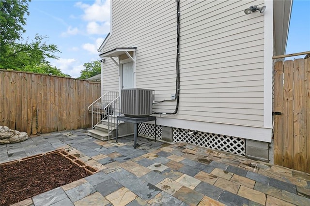3316 Calhoun St, New Orleans, LA 70125 - fenced backyard with central air condition unit and a patio