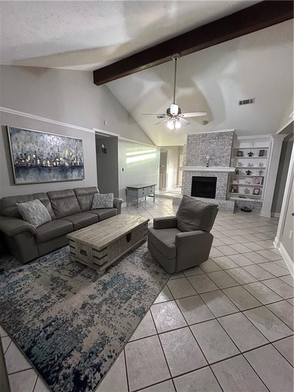 1705 Armagh Dr, Marrero, LA 70072 - living area with light tile patterned floors, ceiling fan, a fireplace, and a textured ceiling