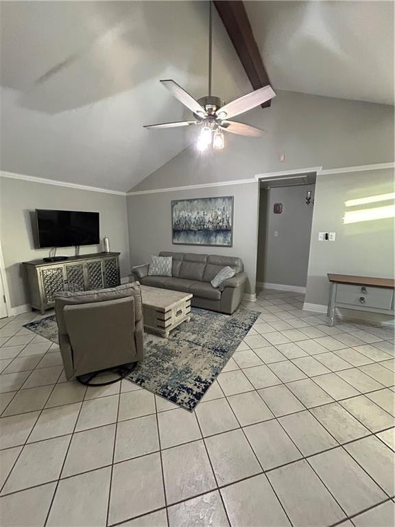 1705 Armagh Dr, Marrero, LA 70072 - living area with a ceiling fan, light tile patterned floors, baseboards, and ornamental molding
