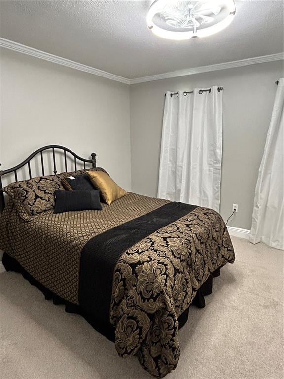 1705 Armagh Dr, Marrero, LA 70072 - bedroom with carpet floors and crown molding