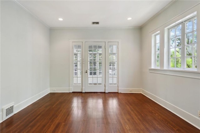 1665 Dufossat St, New Orleans, LA 70115 - empty room with healthy amount of natural light, baseboards, wood finished floors, ornamental molding, and recessed lighting