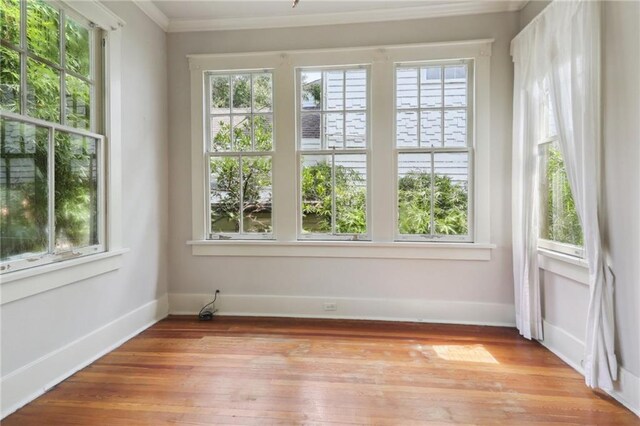 1665 Dufossat St, New Orleans, LA 70115 - unfurnished sunroom with plenty of natural light