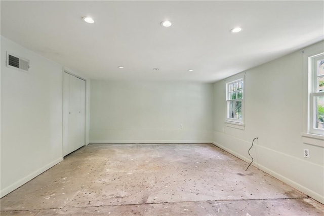 1665 Dufossat St, New Orleans, LA 70115 - spare room featuring baseboards and recessed lighting