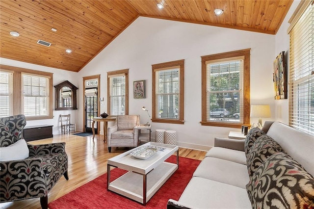 602 Jefferson Ave, New Orleans, LA 70115 - living room with wood ceiling, plenty of natural light, wood finished floors, recessed lighting, and baseboards