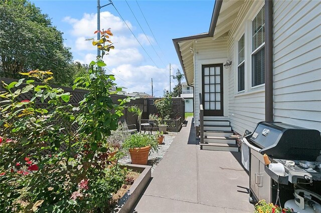 602 Jefferson Ave, New Orleans, LA 70115 - view of patio with a grill and entry steps